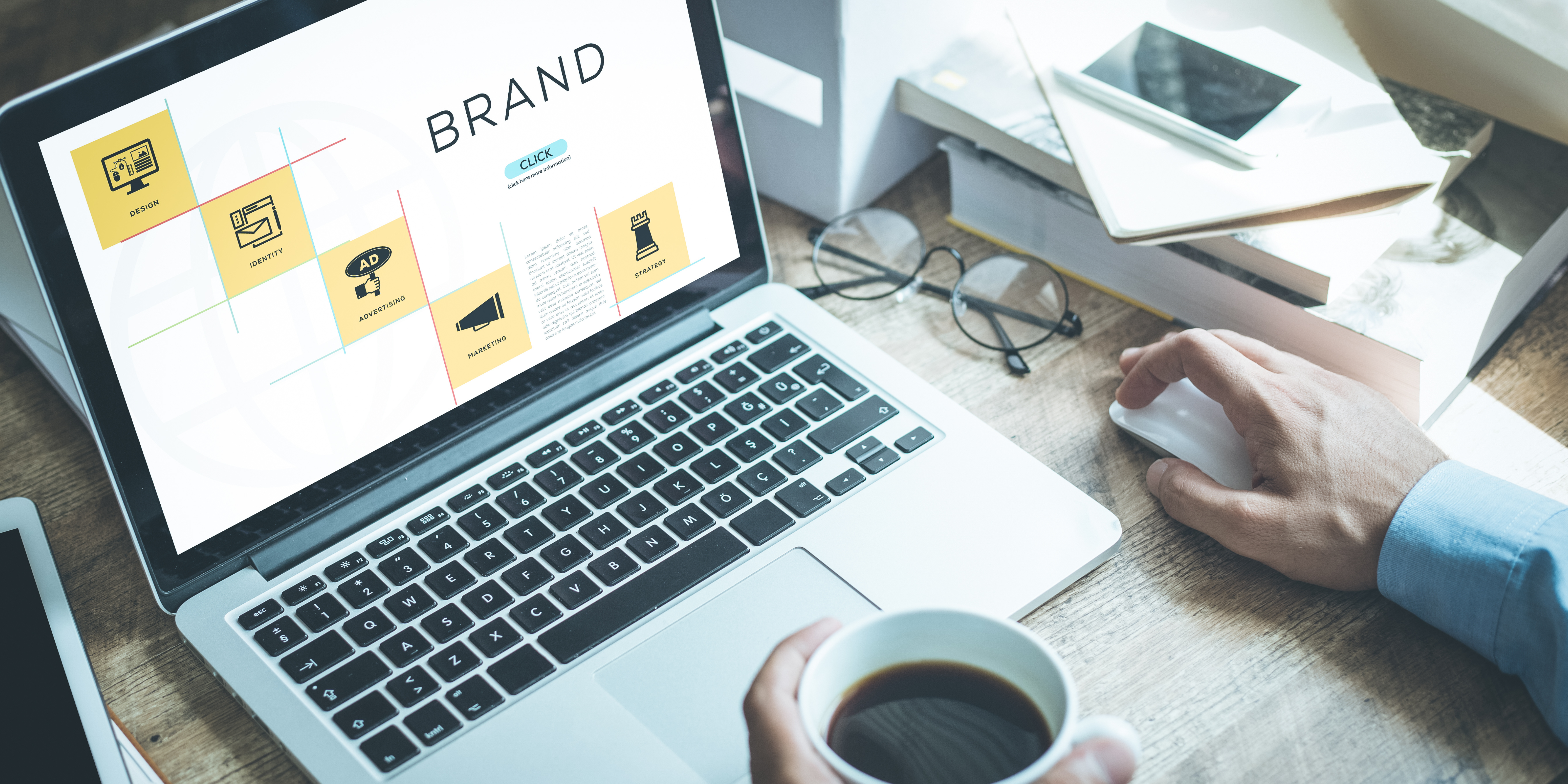 Brand identity moodboard being designed on a laptop